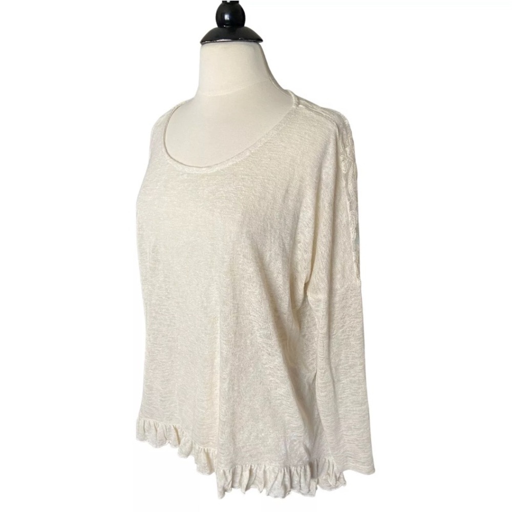 Young‎ at heart lace back oversized ruffle hem top
